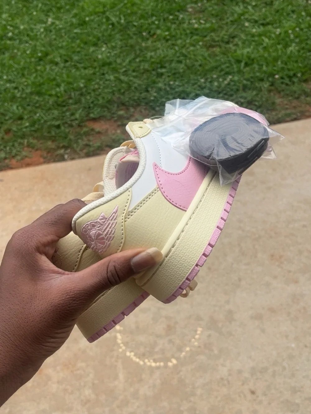 Jordan Low-Top Sneakers in Cream, Pink, and White